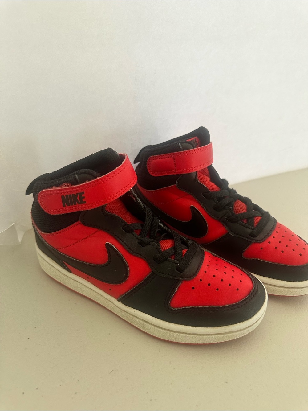 Nike Red and Black High-Top Sneakers with Swoosh